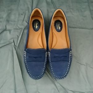 Clarks blue suede slip ons